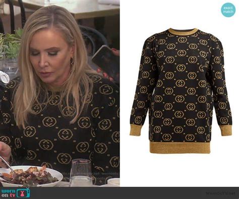 Shannon’s black and gold Gucci logo sweater on The Real